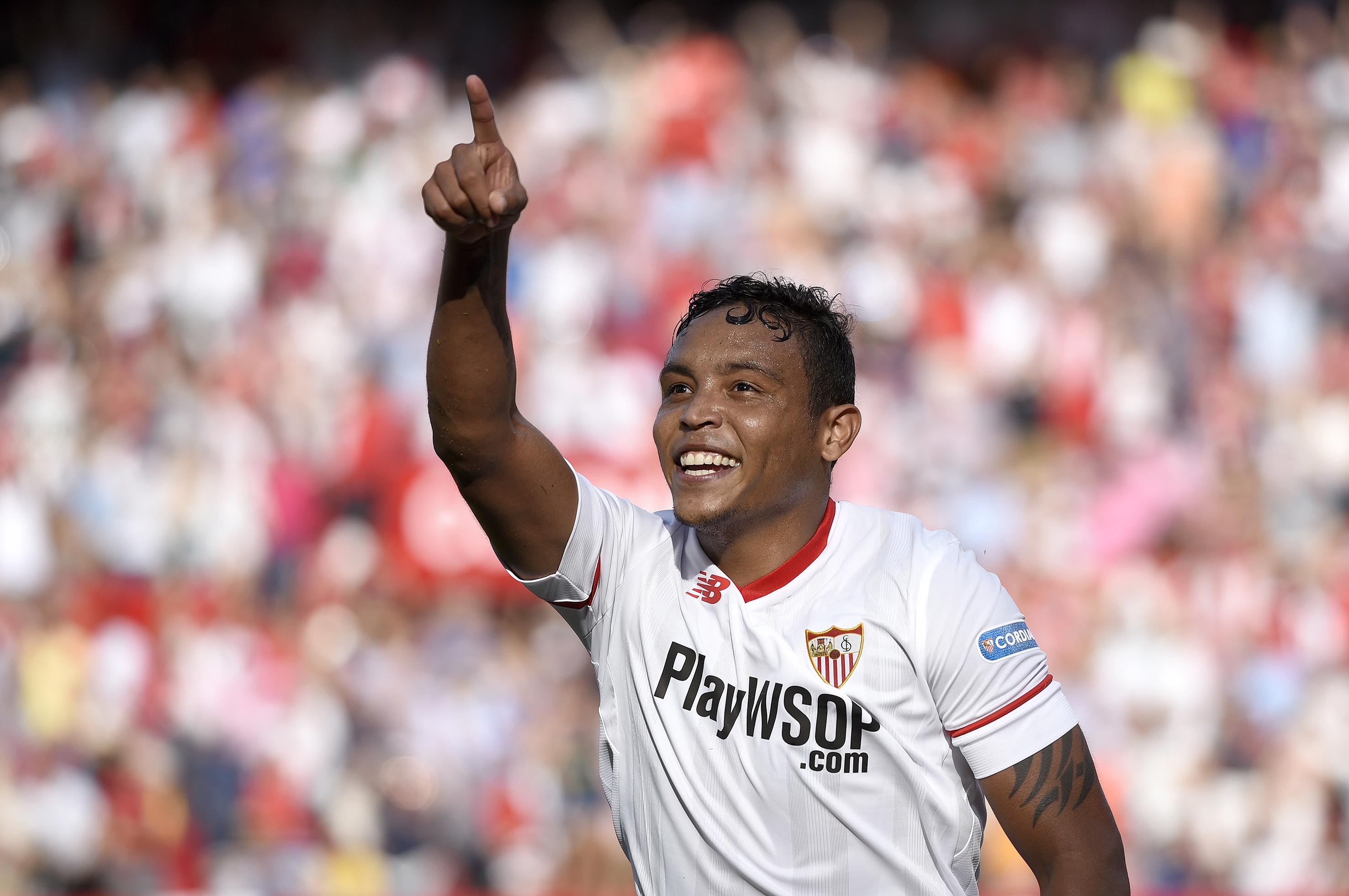 Muriel celebrates putting Sevilla FC 2-0 up against Málaga in the Sánchez-Pizjuán