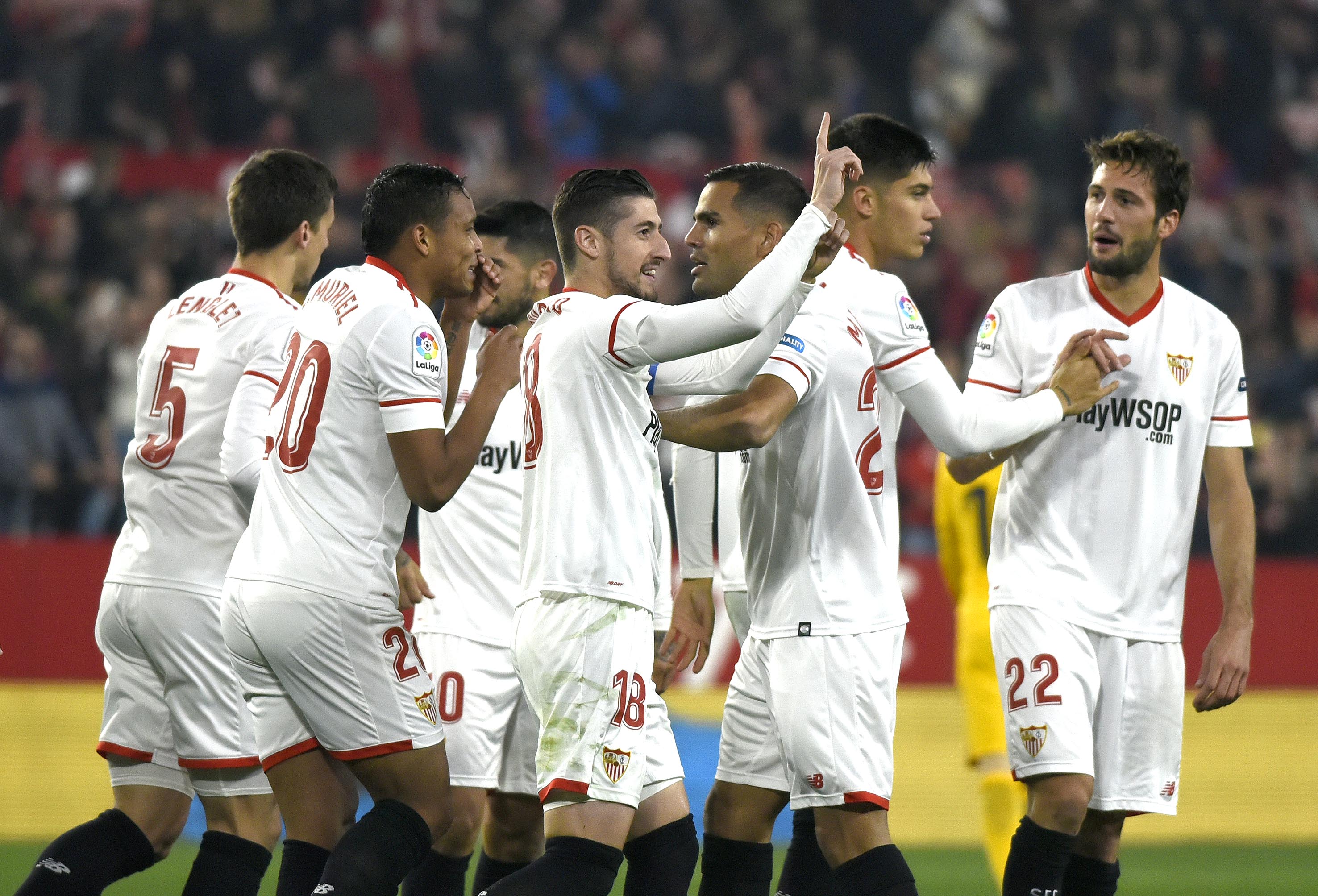 Mercado celebrates a Sevilla goal