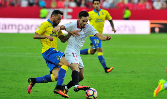 Sarabia of Sevilla FC against Momo of Las Palmas