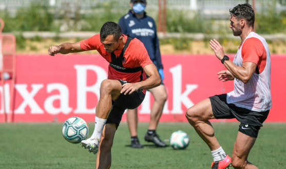 Joan Jordán y Sergi Gómez, en un entrenamiento del Sevilla FC