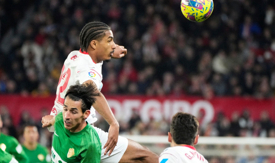 A defensive action shot during the game between Sevilla FC and Elche CF