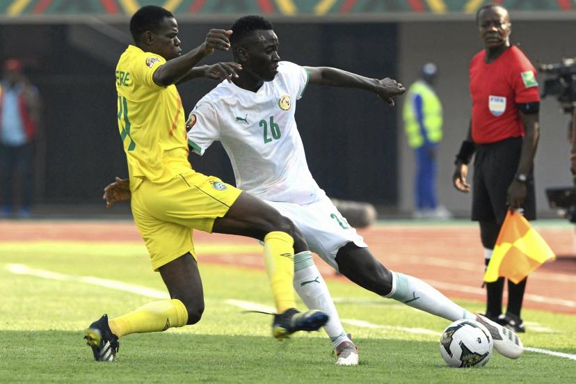Pape Gueye playing for the Senegal national team