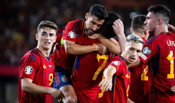 Jesús Navas celebrating with Spain teammates